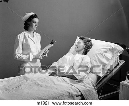 1950 1950S Retro Nurse Patient Woman Bed Hospital Sickness Illness View Large Photo Image Stock Image - 1950 1950S Retro Nurse Patient Woman Bed Hospital Sickness Illness . Fotosearch