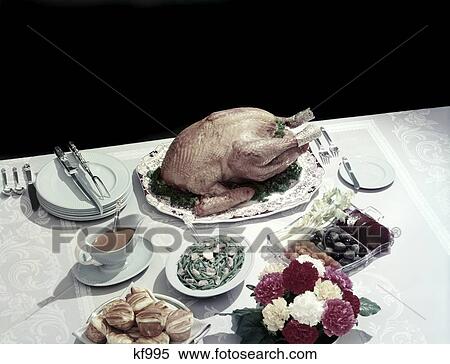 1950 1950S Retro Turkey Carving Thanksgiving Flowers Biscuits Gravy View Large Photo Image Stock Photography - 1950 1950S Retro Turkey Carving Thanksgiving Flowers Biscuits Gravy. Fotosearch