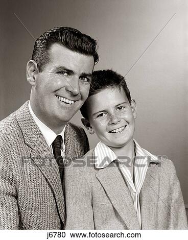 1950 1950S Studio Portrait Smiling Boy Son And Father Boys Sons Fathers Parent Parenthood Fatherhood View Large Photo Image Stock Image - 1950 1950S Studio Portrait Smiling Boy Son And Father Boys Sons Fathers Parent Parenthood Fatherhood. Fotosearch