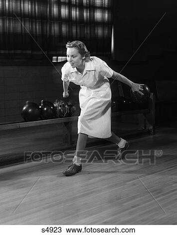 1950 1950S Woman Bowling About To Release Bowling Ball Down Alley View Large Photo Image Stock Image - 1950 1950S Woman Bowling About To Release Bowling Ball Down Alley . Fotosearch