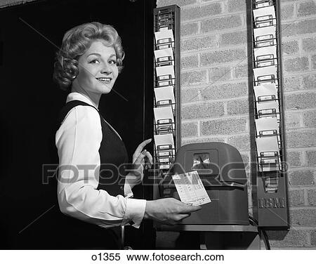 1950 1950S Woman In Office With Timecard And Timecard Clock View Large Photo Image Stock Photography - 1950 1950S Woman In Office With Timecard And Timecard Clock . Fotosearch