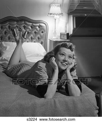 1950 1950S Woman Lying On Bed Like Gidget View Large Photo Image Picture - 1950 1950S Woman Lying On Bed Like Gidget . Fotosearch