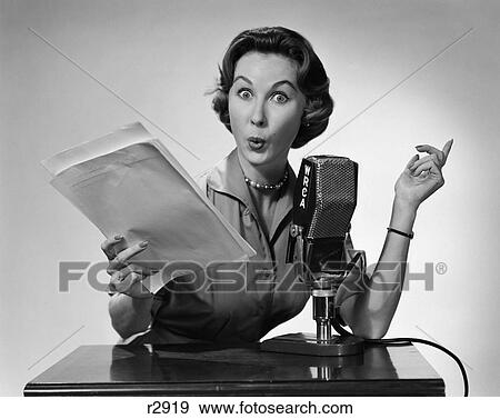 1950 1950'S Woman Talking Into Radio Microphone Holding Papers Exaggerated Facial Expression View Large Photo Image Stock Photo - 1950 1950'S Woman Talking Into Radio Microphone Holding Papers Exaggerated Facial Expression . Fotosearch