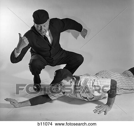 1950A Baseball Umpire Calling Sliding Player Out Studio Shot View Large Photo Image Picture - 1950A Baseball Umpire Calling Sliding Player Out Studio Shot . Fotosearch
