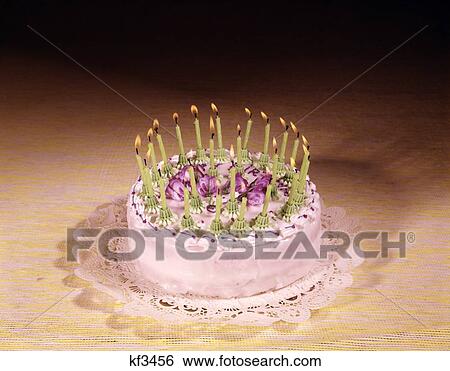 Stock Photograph - 1950'S 1960'S 1970'S Birthday Cake With Many Candles Studio Indoor Celebration. Fotosearch