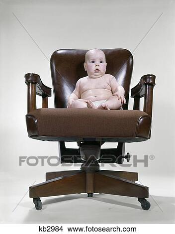 1950'S 1960'S Baby Sitting Office Chair Business Symbolic Studio View Large Photo Image Picture - 1950'S 1960'S Baby Sitting Office Chair Business Symbolic Studio. Fotosearch