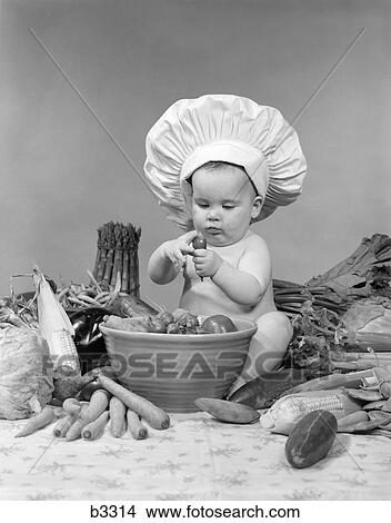 1950S 1960S Baby Wearing Chef Hat Toque Bowl And Raw Vegetables Making A Salad Cook Food Career View Large Photo Image Picture - 1950S 1960S Baby Wearing Chef Hat Toque Bowl And Raw Vegetables Making A Salad Cook Food Career . Fotosearch