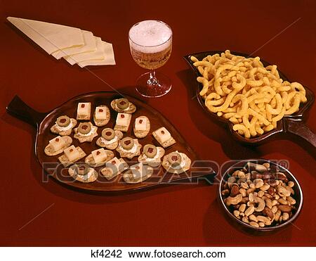 1950S 1960S Canapes Snacks Glass Of Beer Napkins View Large Photo Image Stock Image - 1950S 1960S Canapes Snacks Glass Of Beer Napkins. Fotosearch