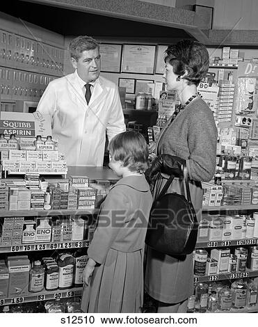 1950S 1960S Mother Daughter Counter Pharmacy Pharmacist Behind Counter Shelves Stocked Aspirin Products Medicine View Large Photo Image Stock Image - 1950S 1960S Mother Daughter Counter Pharmacy Pharmacist Behind Counter Shelves Stocked Aspirin Products Medicine . Fotosearch