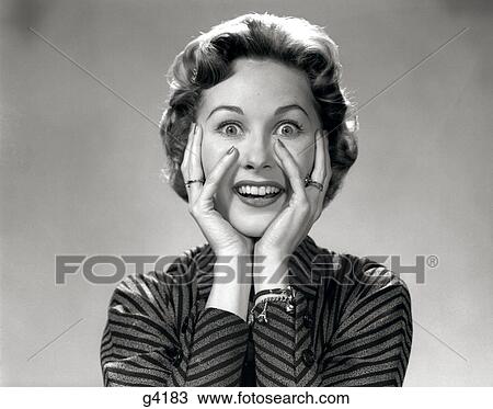 1950S 1960S Portrait Woman Hands On Face Smiling Excited Happy Expression Funny Face Charm Bracelet Striped Dress Wacky View Large Photo Image Stock Image - 1950S 1960S Portrait Woman Hands On Face Smiling Excited Happy Expression Funny Face Charm Bracelet Striped Dress Wacky . Fotosearch