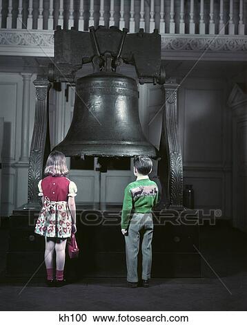 1950S 2 Kids From Back Girl In Red Dress Boy Green Sweater Stand Before Liberty Bell Philadelphia Pa Symbol Freedom Usa View Large Photo Image Stock Image - 1950S 2 Kids From Back Girl In Red Dress Boy Green Sweater Stand Before Liberty Bell Philadelphia Pa Symbol Freedom Usa. Fotosearch