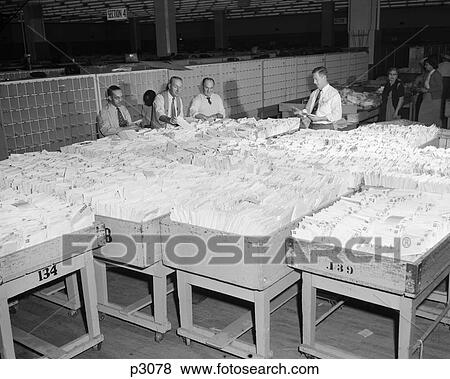 1950S 4 Men Sort Sorting Letters Mail From Large Bins Full Stuffed With Many Envelopes View Large Photo Image Stock Photo - 1950S 4 Men Sort Sorting Letters Mail From Large Bins Full Stuffed With Many Envelopes . Fotosearch