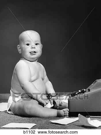 1950S Baby In Diaper Sticking Out Tongue Holding Glasses Sitting Before Adding Machine View Large Photo Image Stock Image - 1950S Baby In Diaper Sticking Out Tongue Holding Glasses Sitting Before Adding Machine . Fotosearch