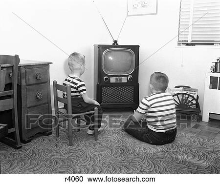 1950S Back View Of 2 Boys In Striped T-Shirts Watching Tv View Large Photo Image Stock Image - 1950S Back View Of 2 Boys In Striped T-Shirts Watching Tv . Fotosearch