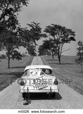 Stock Photograph - 1950S Back View Of Car With Just Married Sign . Fotosearch