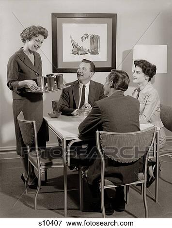 1950S Card Party Of 2 Couples With Woman Serving Drinks View Large Photo Image Stock Photo - 1950S Card Party Of 2 Couples With Woman Serving Drinks . Fotosearch
