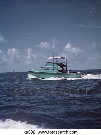 1950S Charter Fishing Boat Turquoise Breaking White Wave Wake In Deep Blue Water Sport Fishing Florida View Large Photo Image Stock Image - 1950S Charter Fishing Boat Turquoise Breaking White Wave Wake In Deep Blue Water Sport Fishing Florida. Fotosearch