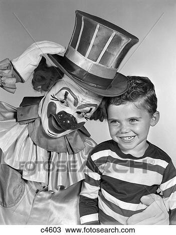 1950S Clown With Top Hat Arm Around 3 Year Old Boy In Striped Shirt View Large Photo Image Stock Image - 1950S Clown With Top Hat Arm Around 3 Year Old Boy In Striped Shirt . Fotosearch