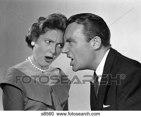 1950S Couple Arguing Yelling Foreheads Touching Indoor View Large Photo Image Stock Image - 1950S Couple Arguing Yelling Foreheads Touching Indoor . Fotosearch