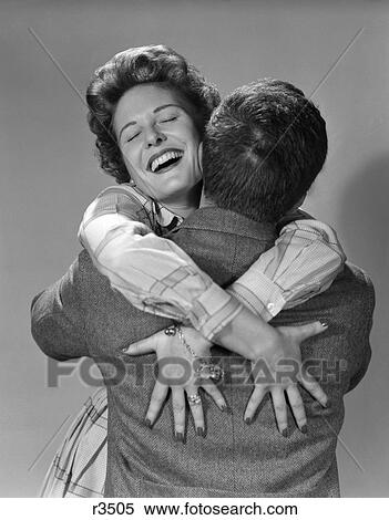 1950S Couple Man And Happy Woman Embrace Hugging View Large Photo Image Stock Photography - 1950S Couple Man And Happy Woman Embrace Hugging. Fotosearch