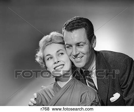 1950S Couple Portrait Smiling Cheek To Cheek Studio Shot View Large Photo Image Stock Photo - 1950S Couple Portrait Smiling Cheek To Cheek Studio Shot . Fotosearch
