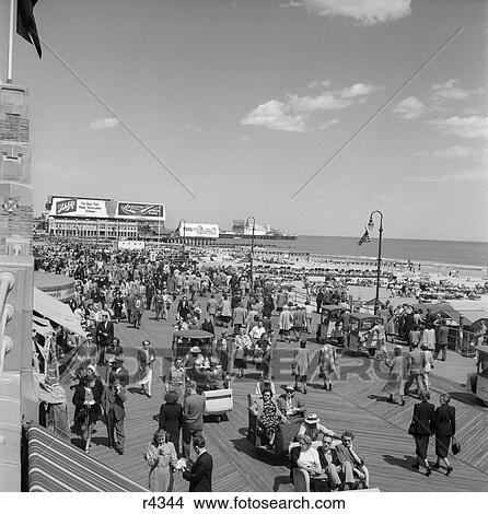 1950S Crowd People Men Women Boardwalk Atlantic City Nj Beach Summer Shore Vacation Retro View Large Photo Image Picture - 1950S Crowd People Men Women Boardwalk Atlantic City Nj Beach Summer Shore Vacation Retro . Fotosearch