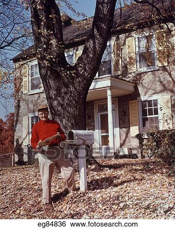 1950S Elderly Man Red Shirt Getting Mail In Front Of Stone House Autumn View Large Photo Image Stock Photograph - 1950S Elderly Man Red Shirt Getting Mail In Front Of Stone House Autumn. Fotosearch