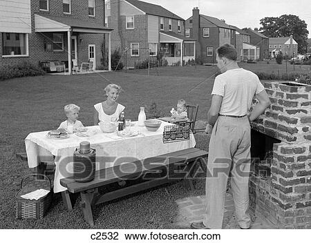 1950S Family In Backyard Cooking Hamburgers View Large Photo Image Stock Image - 1950S Family In Backyard Cooking Hamburgers . Fotosearch