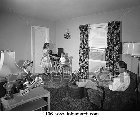 1950S Family Living Room Dad Newspaper Mother Sewing Kids Boy Girl Record Player View Large Photo Image Stock Photograph - 1950S Family Living Room Dad Newspaper Mother Sewing Kids Boy Girl Record Player . Fotosearch
