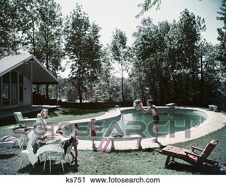 1950S Family Man Woman Son Daughter Four Backyard Kidney Swimming Pool Picnic Food Beach Ball House Trees Summer Retro View Large Photo Image Stock Image - 1950S Family Man Woman Son Daughter Four Backyard Kidney Swimming Pool Picnic Food Beach Ball House Trees Summer Retro. Fotosearch