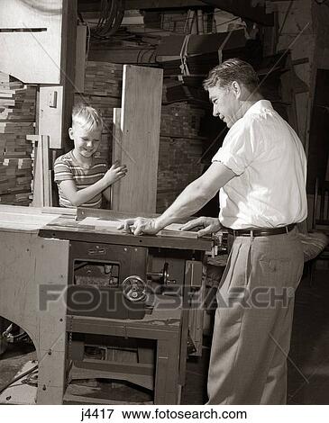1950S Father Teaching Son Carpentry View Large Photo Image Stock Photo - 1950S Father Teaching Son Carpentry . Fotosearch
