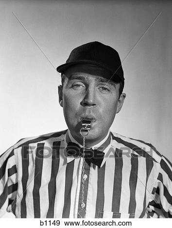 Stock Photo - 1950S Football Referee Blowing Whistle . Fotosearch