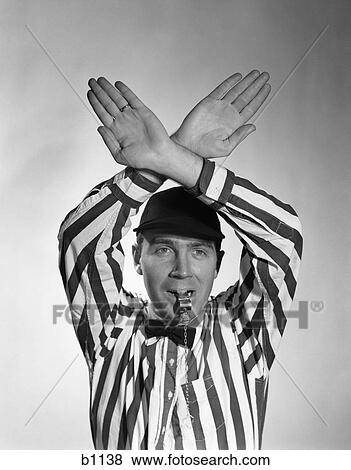 1950S Football Referee Making Hand Signal Time Out Blowing Whistle View Large Photo Image Stock Photo - 1950S Football Referee Making Hand Signal Time Out Blowing Whistle . Fotosearch