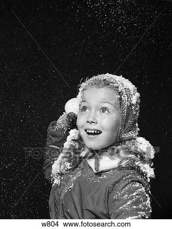 Picture - 1950S Girl With Snow On Hat And Hair Smiling Mouth Open Teeth Showing Shot In Studio . Fotosearch