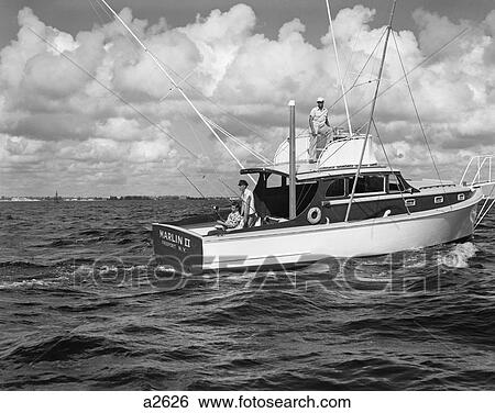 1950S Group Of 3 Men Trolling Off Of Fishing Boat In Gulf Stream View Large Photo Image Stock Photograph - 1950S Group Of 3 Men Trolling Off Of Fishing Boat In Gulf Stream . Fotosearch