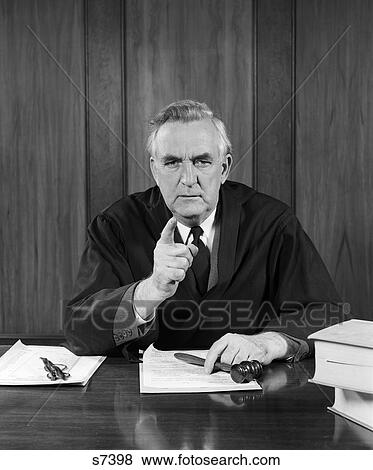 1950S Judge At Bench Pointing At Camera With Stern Look & Other Hand Over Gavel View Large Photo Image Stock Photo - 1950S Judge At Bench Pointing At Camera With Stern Look & Other Hand Over Gavel . Fotosearch