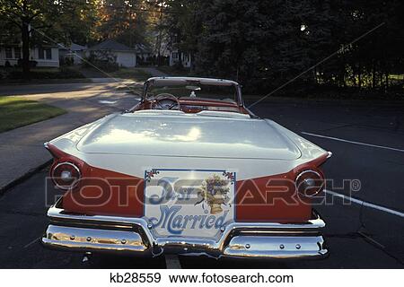 1950S Just Married Sign On Back Of Ford Convertible Car View Large Photo Image Stock Photo - 1950S Just Married Sign On Back Of Ford Convertible Car . Fotosearch