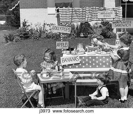 1950S Kids In Backyard Playing Store With Signs Selling Apples Bananas Sandwiches Lollypops View Large Photo Image Stock Image - 1950S Kids In Backyard Playing Store With Signs Selling Apples Bananas Sandwiches Lollypops . Fotosearch