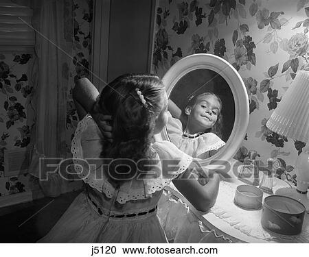 1950S Little Girl Posing Refelcted In Mirror At Vanity Table View Large Photo Image Stock Image - 1950S Little Girl Posing Refelcted In Mirror At Vanity Table . Fotosearch