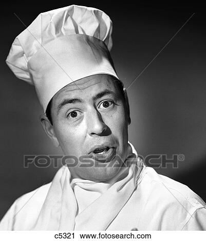 Stock Image - 1950S Man Chef Head Shot Humorous Expression Indoor . Fotosearch