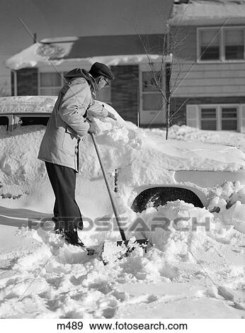 1950S Man In Front Of House Shoveling Snow From Buried Car View Large Photo Image Stock Photo - 1950S Man In Front Of House Shoveling Snow From Buried Car . Fotosearch