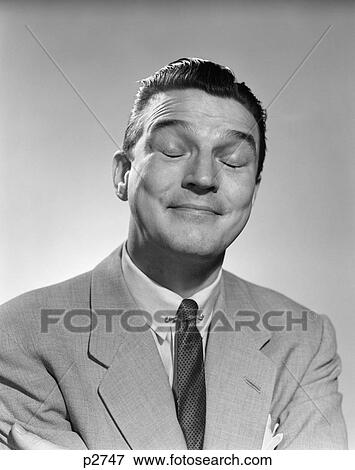 1950S Man Smiling Eyes Closed Thinking Thoughtful Relaxed Smelling Funny Facial Expression View Large Photo Image Stock Photo - 1950S Man Smiling Eyes Closed Thinking Thoughtful Relaxed Smelling Funny Facial Expression . Fotosearch
