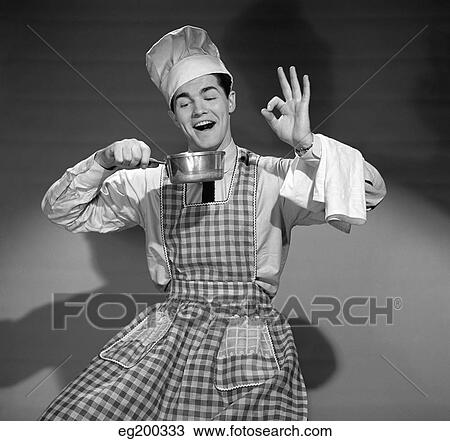 1950S Man Wearing Chefs Hat And Apron Holding Pot Making Okay Sign View Large Photo Image Stock Image - 1950S Man Wearing Chefs Hat And Apron Holding Pot Making Okay Sign. Fotosearch