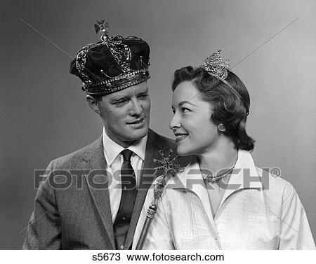 1950S Man & Woman Wearing King & Queen Crowns Looking At Each Other Man Holding Scepter View Large Photo Image Stock Image - 1950S Man & Woman Wearing King & Queen Crowns Looking At Each Other Man Holding Scepter . Fotosearch