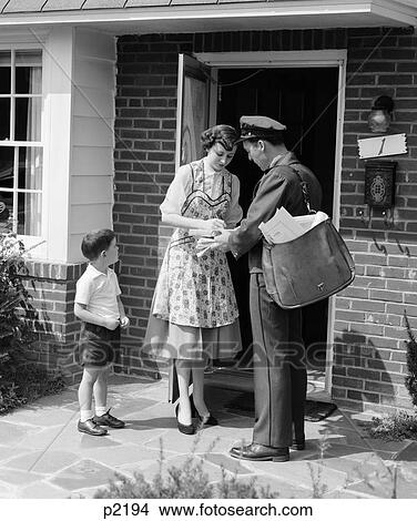 1950S Mom With Son Signing For Package At Door View Large Photo Image Picture - 1950S Mom With Son Signing For Package At Door . Fotosearch