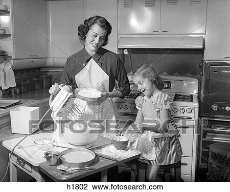 1950S Mother & Daughter Baking A Cake View Large Photo Image Stock Image - 1950S Mother & Daughter Baking A Cake . Fotosearch