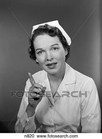 1950S Nurse Woman Portrait Wagging One Finger Towards Camera Admonishing Lecture Health Care Warning View Large Photo Image Stock Image - 1950S Nurse Woman Portrait Wagging One Finger Towards Camera Admonishing Lecture Health Care Warning . Fotosearch