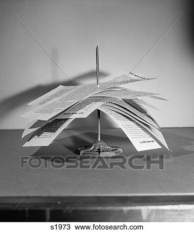 1950S Office Spindle Spike With Papers Messages Bills Impaled Stuck On Impale Sharp Retro Organized Organization System View Large Photo Image Stock Image - 1950S Office Spindle Spike With Papers Messages Bills Impaled Stuck On Impale Sharp Retro Organized Organization System. Fotosearch