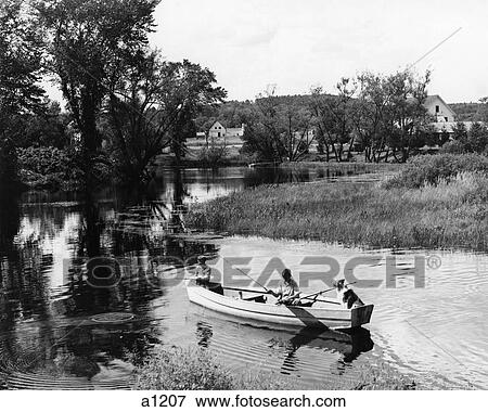 1950S Pair Of Boys In Rowboat With Collie Fishing In Farm Area View Large Photo Image Stock Photo - 1950S Pair Of Boys In Rowboat With Collie Fishing In Farm Area . Fotosearch