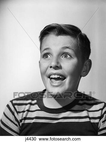 1950S Portrait Happy Smiling Boy Stripe Shirt Looking Off To Side Facial Expression View Large Photo Image Stock Image - 1950S Portrait Happy Smiling Boy Stripe Shirt Looking Off To Side Facial Expression . Fotosearch